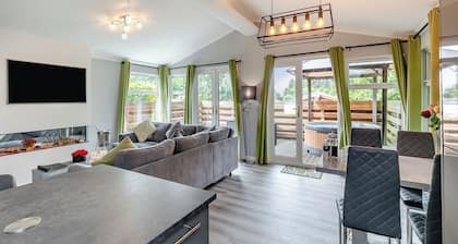 Large superior one-bedroom lodge with hot tub for two adults.