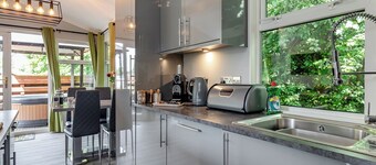 Large superior one-bedroom lodge with hot tub for two adults.