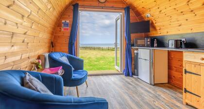 A quirky pod with one double and shower room.