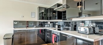 Luxury and contemporary retreat with a spacious open plan kitchen/lounge area.