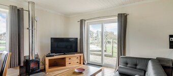 Luxury and contemporary retreat with a spacious open plan kitchen/lounge area.