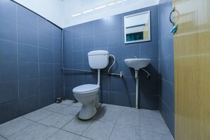 Suite familiar | Baño | Regadera y toallas