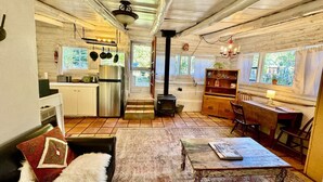 A cozy interior with a kitchen, dining area, and living space.