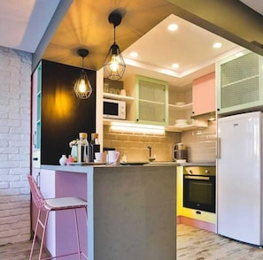 Habitación Deluxe, 1 habitación, para fumadores, vista al río | Cocina privada