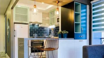 Quarto solteiro elite | Cozinha privada
