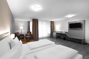 Comfort Business Room | Hypo-allergenic bedding, individually decorated, desk, bed sheets - HerzogsPark Apartments mit/ohne Küche (Herzogenaurach)