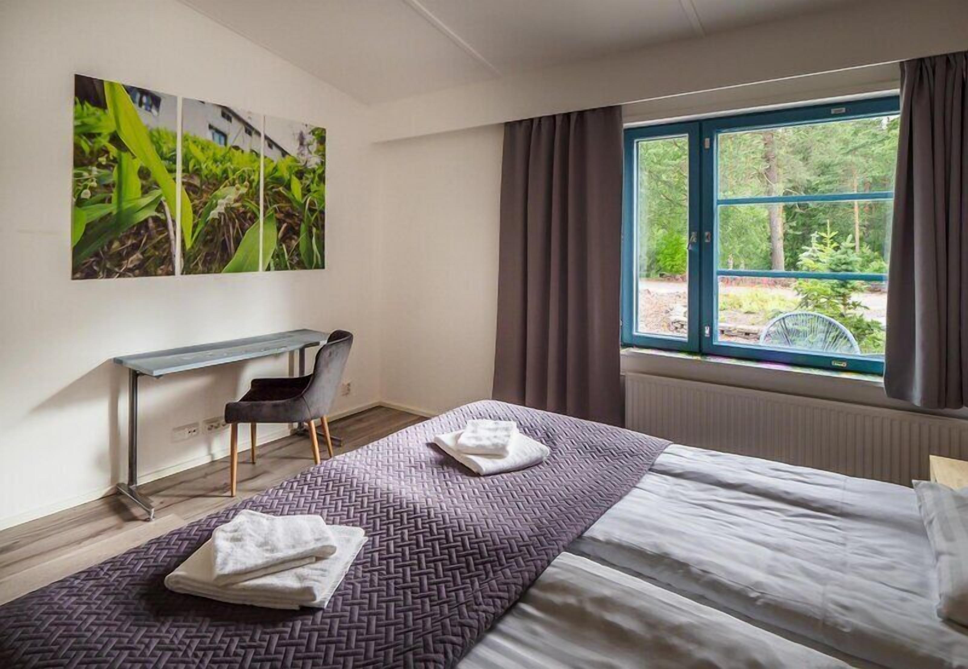 Superior Apartment | Premium bedding, memory foam beds, laptop workspace, travel crib