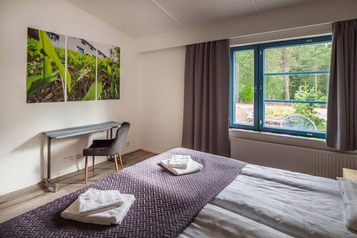 Superior Apartment | Premium bedding, memory foam beds, laptop workspace, travel crib