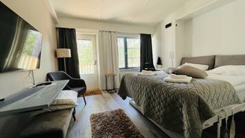 1 bedroom, premium bedding, memory-foam beds, laptop workspace