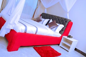 Standard Room | Egyptian cotton sheets, premium bedding, down duvets, in-room safe - Elanacha Hotel (Arusha)