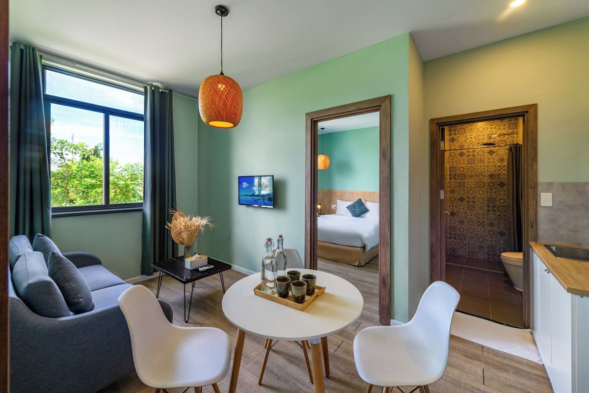 Family Suite, 2 Bedrooms | Living area | 32-inch Smart TV with cable channels, TV