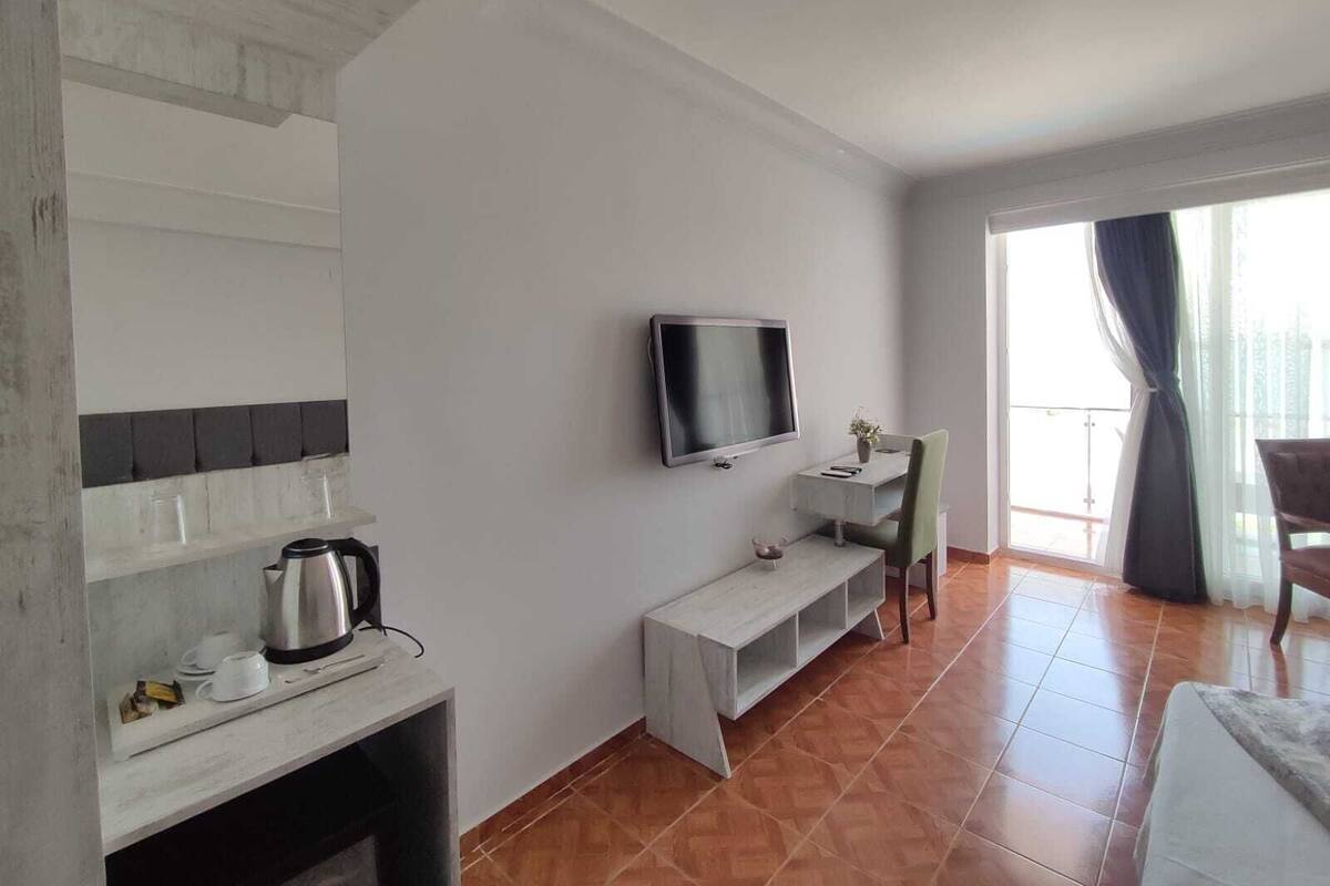 Family Suite | Minibar, desk, laptop workspace, iron/ironing board (on request)