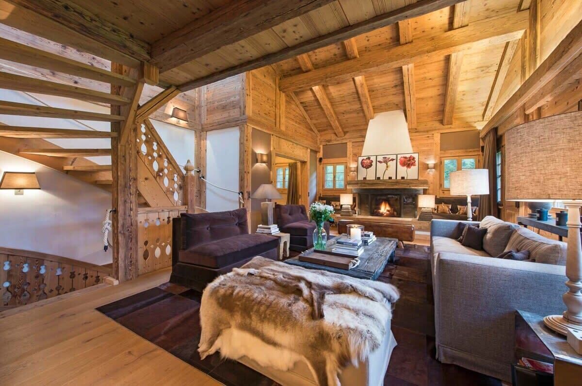 view of the living room and the stair case going to entrance and to the bedrooms 