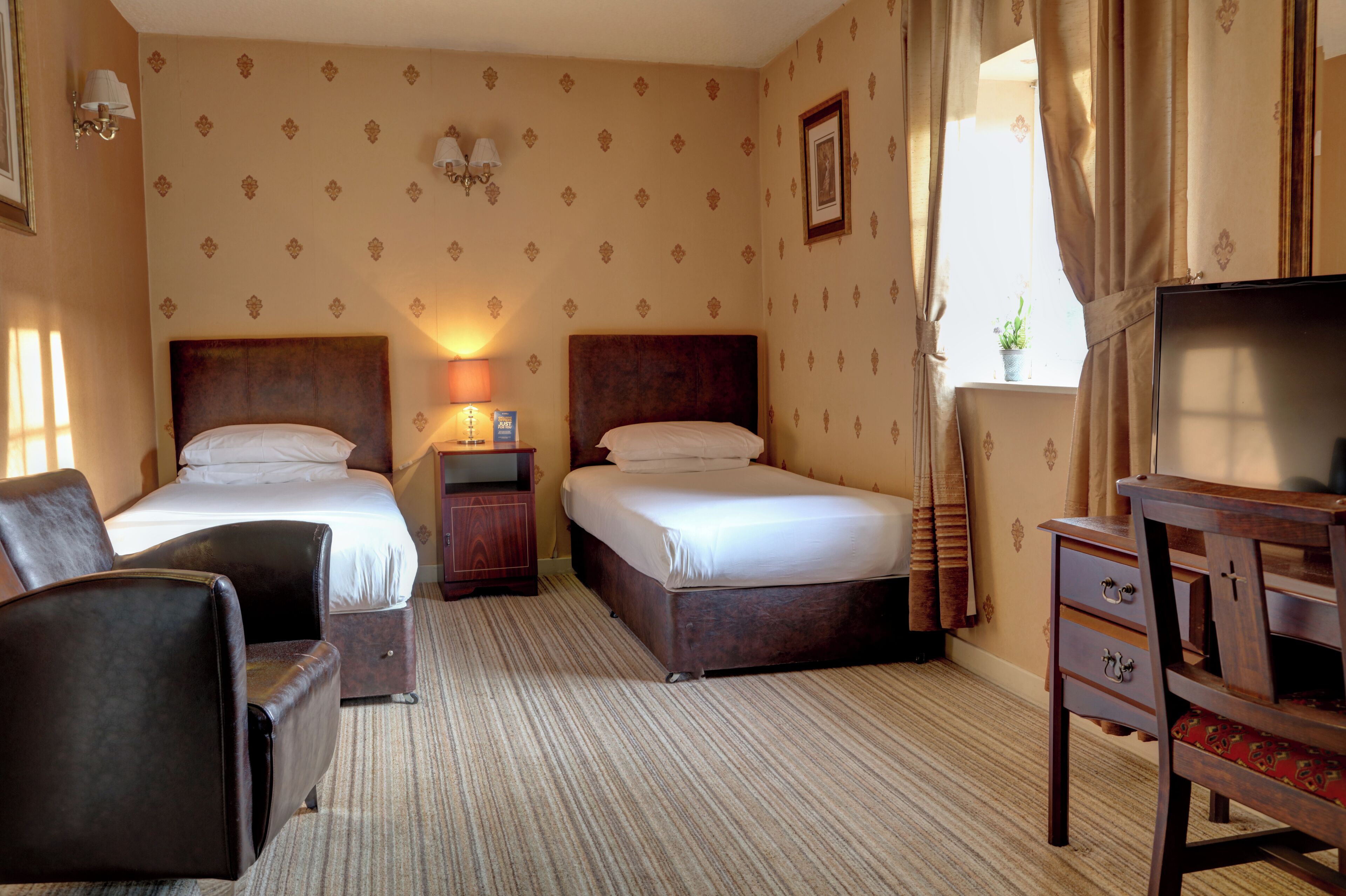 family room, multiple beds | 1 bedroom, iron/ironing board, free wifi, bed sheets