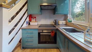 Fridge, microwave, oven, dining tables