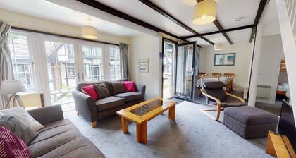 A comfortable accommodation for up to nine guests set within the grounds of Tolroy Manor