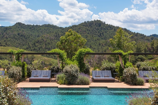 Outdoor pool, open 10:00 AM to 7:00 PM, cabanas (surcharge)