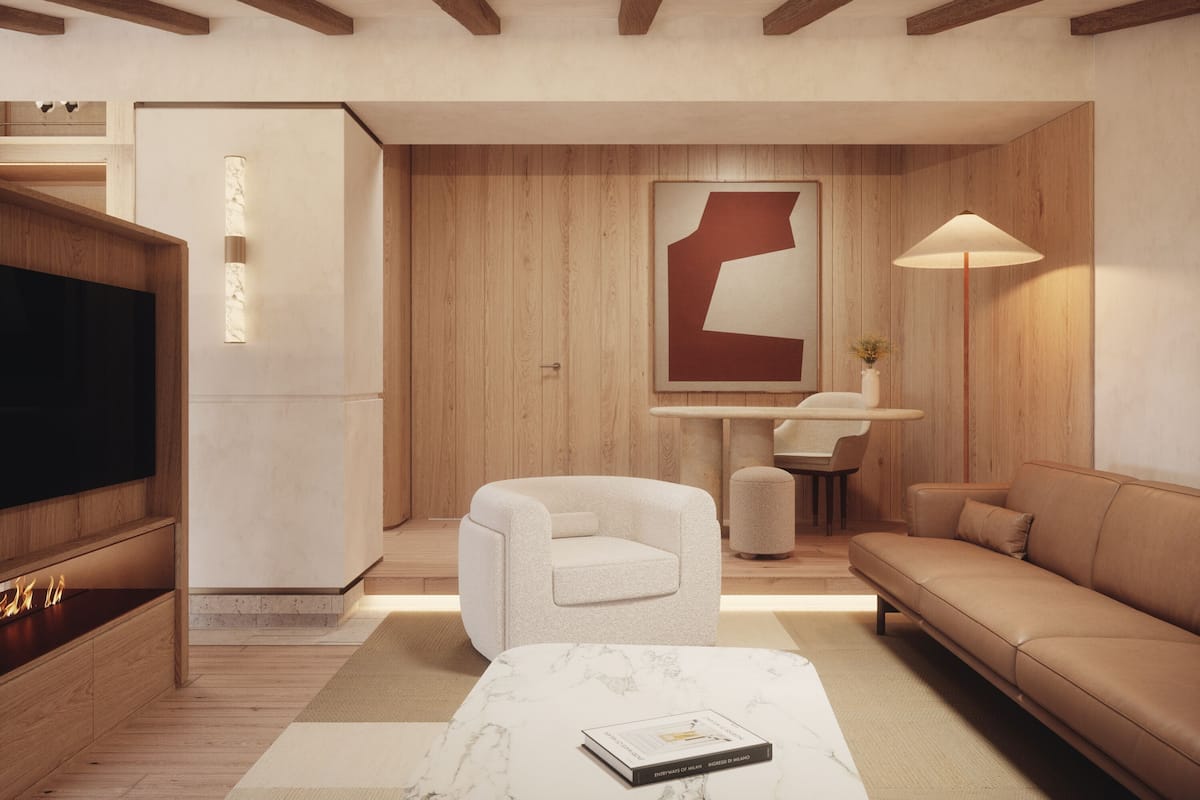 A modern living room with a flat-screen TV, a sofa, a coffee table, and a lamp.