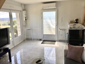 Shower, hair dryer, towels, toilet paper