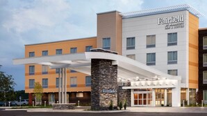 A Fairfield Inn & Suites hotel with a modern design, featuring a prominent entrance and multiple floors. - Fairfield Inn & Suites by Marriott Fort Worth Alliance Airport (Fort Worth)