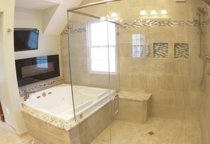 Bathtub, jetted tub, hair dryer, towels