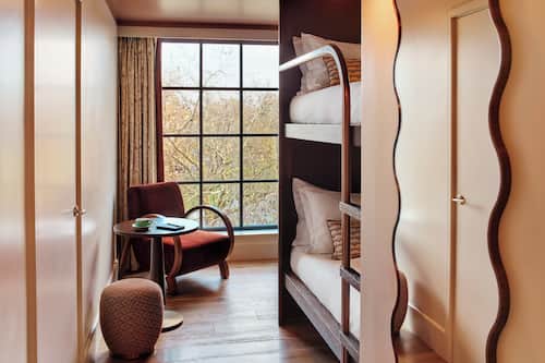 Snug Bunk Beds | Minibar, in-room safe, blackout curtains, free WiFi