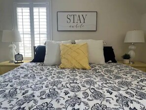 1 bedroom, desk, iron/ironing board, travel crib