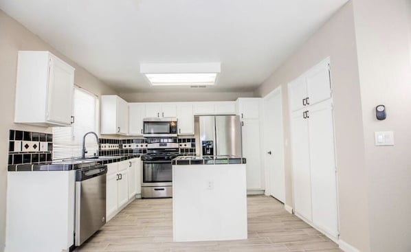 Fridge, microwave, oven, stovetop