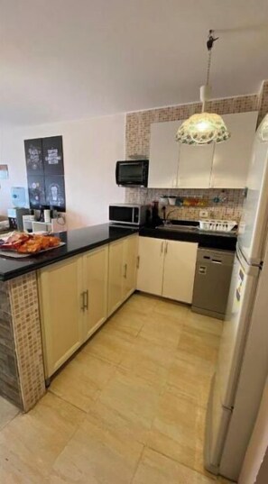 Fridge, microwave, oven, dishwasher