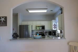 Fridge, microwave, oven, stovetop - Ironwood @ Barefoot Resort and Golf, overlooking tee 13 of Greg N (North Myrtle Beach)