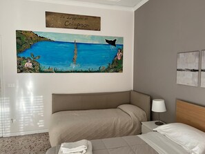 2 bedrooms, desk, iron/ironing board, travel crib