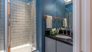 Hair dryer, towels, soap, toilet paper
