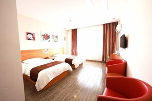 A hotel room with two beds, a TV, a red chair, and artwork on the wall. - Aoliyang Business Hotel (Zhuanghe Jinma Plaza) (Zhuanghe)