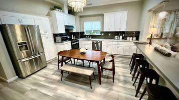 Coffee/tea maker, fridge, microwave, oven
