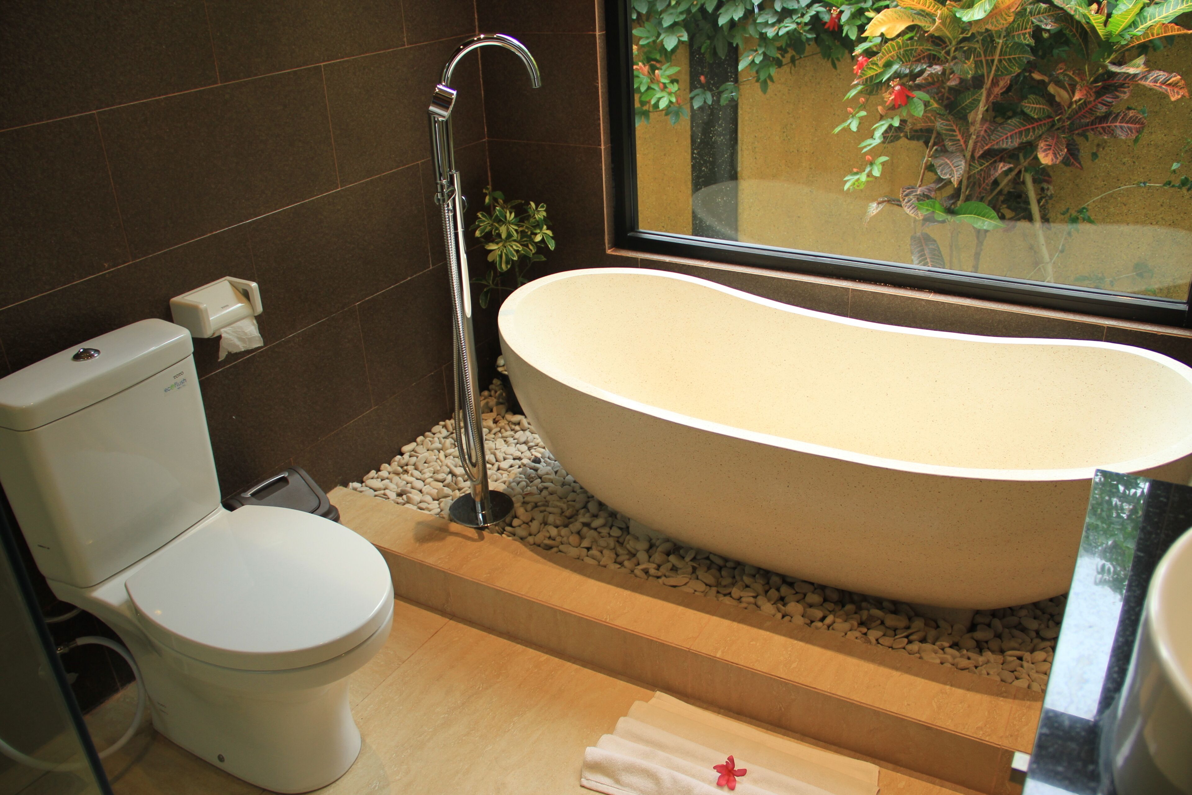 Bathtub, hair dryer, towels, soap