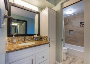Combined shower/bathtub, hair dryer, towels, soap