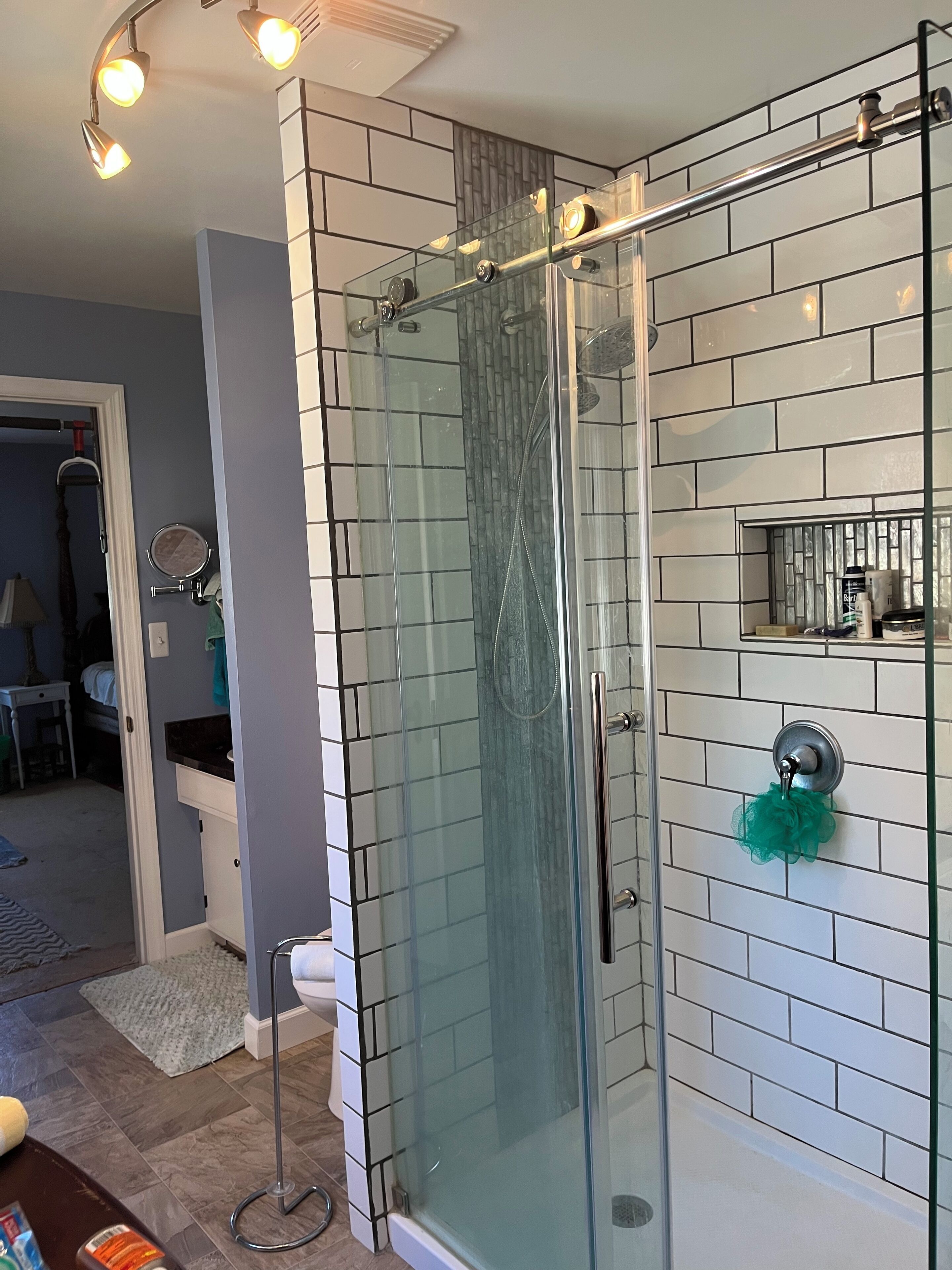 Combined shower/tub, hair dryer, towels, soap