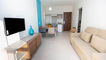 Deluxe Double Room | Living area | Flat-screen TV