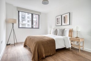 2 dormitorios, tabla de planchar con plancha, wifi y ropa de cama