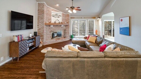 Flat-screen TV, video game console, Hulu, books