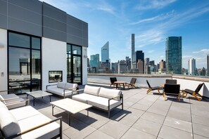 Terrace/patio - Ideal Midtown East 2BR w/ Elevator, Doorman & Gym, near UN, by Blueground (Midtown)