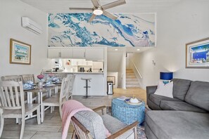 Smart TV, fireplace, books, offices