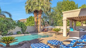 A pool area with lounge chairs, a pergola, and a barbecue setup. - Private Pool, Pool Table, BBQ, Near San Diego Padres & Seattle Mariners Spring Training + FREE GOLF! (Glendale)