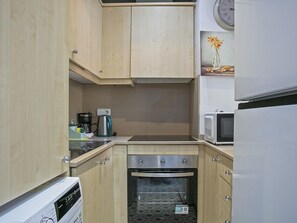 Fridge, microwave, cookware/dishes/utensils