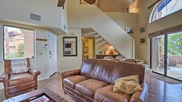 TV, fireplace, books