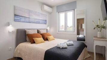 5 dormitorios, tabla de planchar con plancha, cuna de viaje y wifi