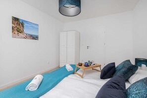 2 habitaciones, tabla de planchar con plancha, wifi y ropa de cama 