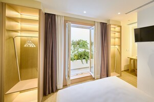 Habitación Confort | Cortinas opacas, sistema de insonorización, wifi gratis y ropa de cama