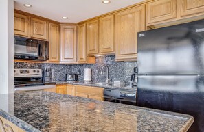 Coffee/tea maker, fridge, microwave, oven - Unwind and Immerse Yourself in Stunning Ocean Views with AC- Kihei Surfside #305 (Kihei, Maui)
