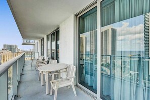 Outdoor dining - Experience the ultimate in coastal living at H Beach House. Make this apartment your dream vacation! (Hollywood)